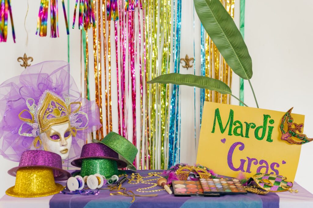 masks and glittery hats on the table